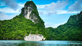 Awaken to Halong Bay’s golden glow